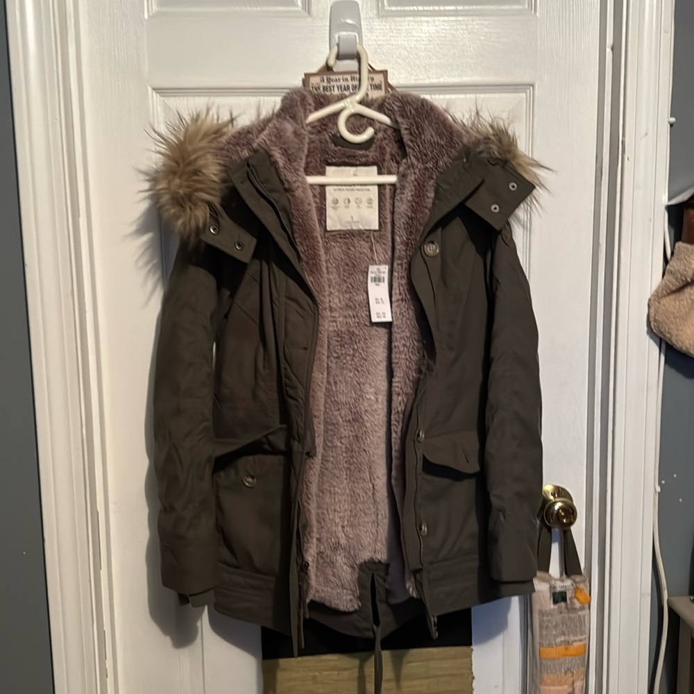 Green Hollister fur lined hooded winter jacket size small
